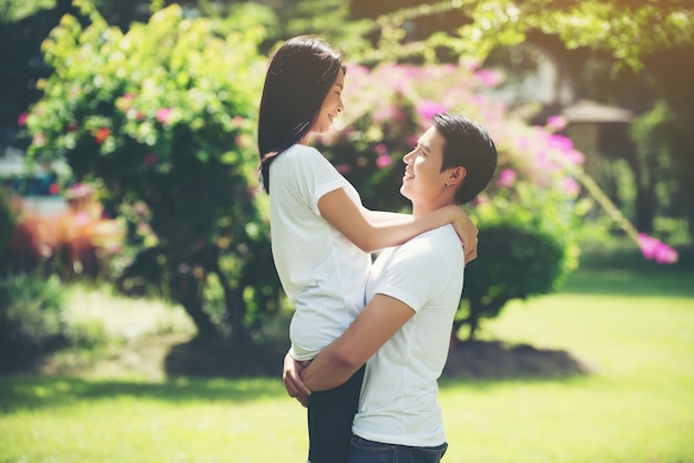 Young Couple hugging together during walking relaxing together