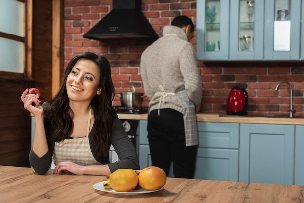 Free Photo young couple in the kitchen together