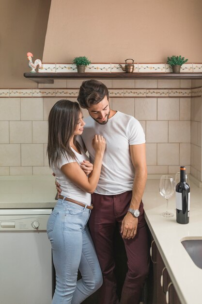 Young couple looking at wine