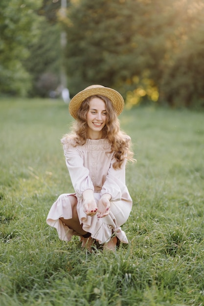 Young couple in love outdoor.Stunning sensual outdoor portrait of young stylish fashion couple posing in summer in field