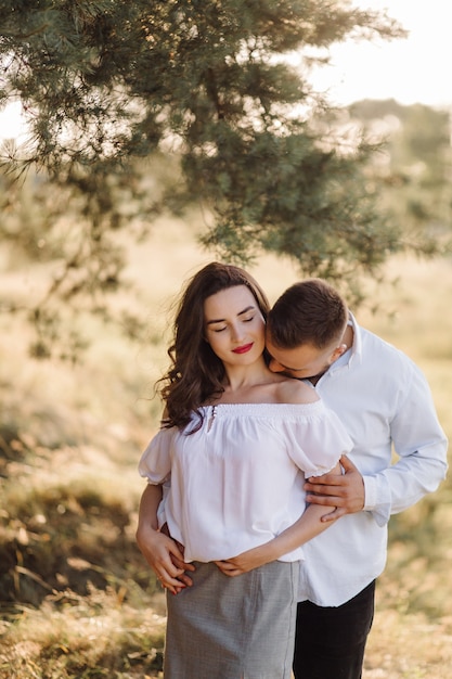 Young couple in love walking in the park