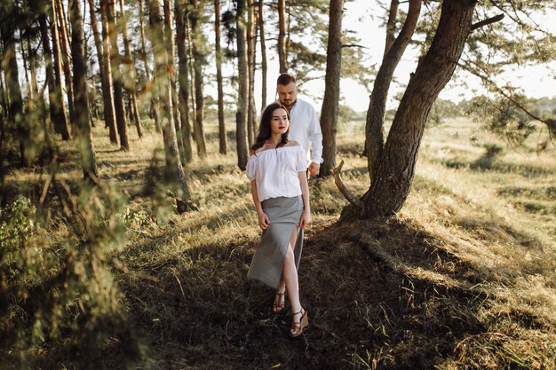 Young couple in love walking in the park