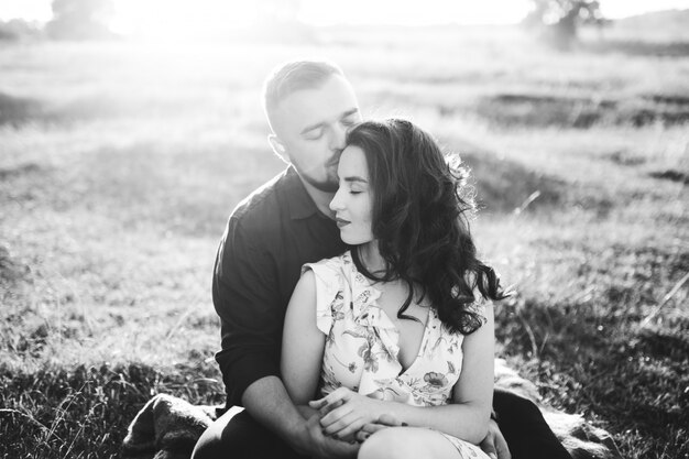 Young couple in love walking in the park