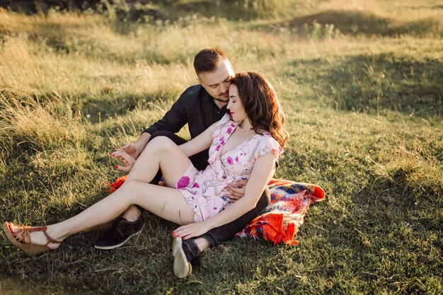 Young couple in love walking in the park