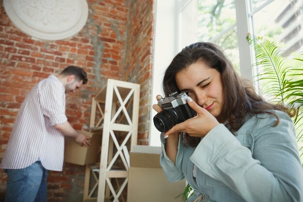 Young couple moved to a new house or apartment