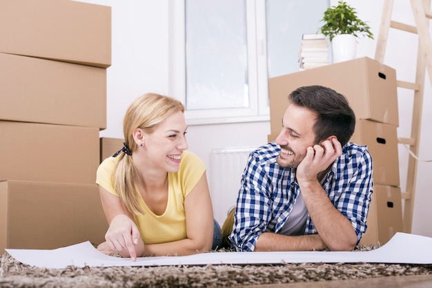 Young couple moving into a new home