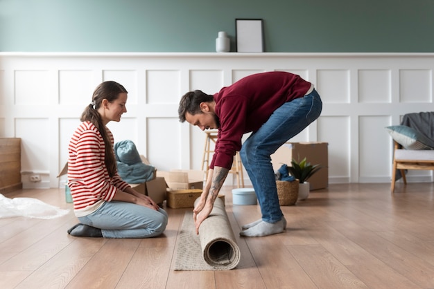 Young couple moving into a new home