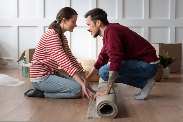 Young couple moving into a new home