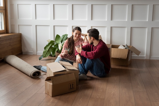 Young couple moving into a new home