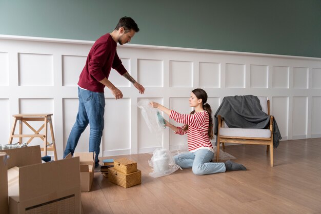 Young couple moving into a new home