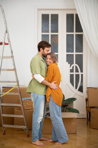 Young couple moving in new home