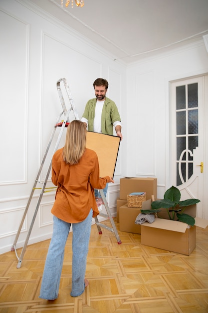 Free Photo young couple moving in new home