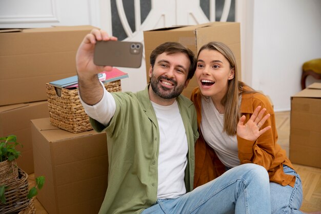 Young couple moving in new home