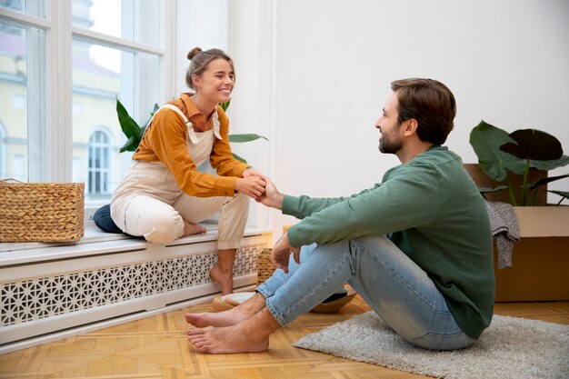 Young couple moving in new home