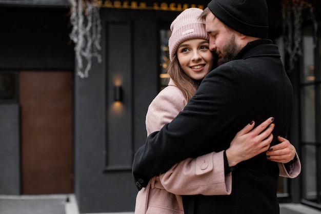 Young couple outdoor hugging