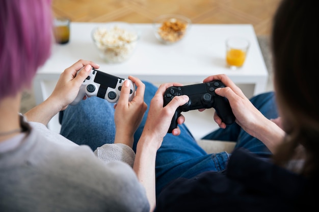 Young couple playing a video game indoors