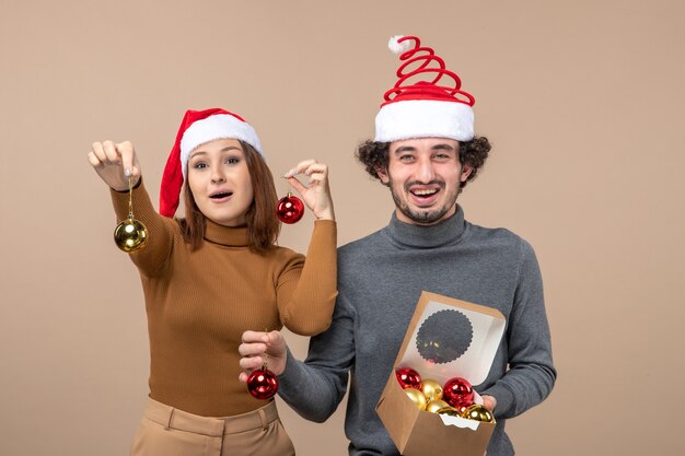 A young couple posing in the studio