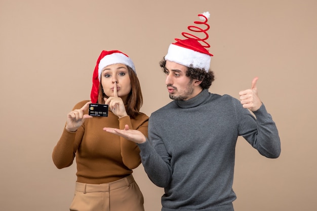 A young couple posing in the studio