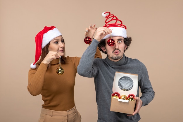 A young couple posing in the studio