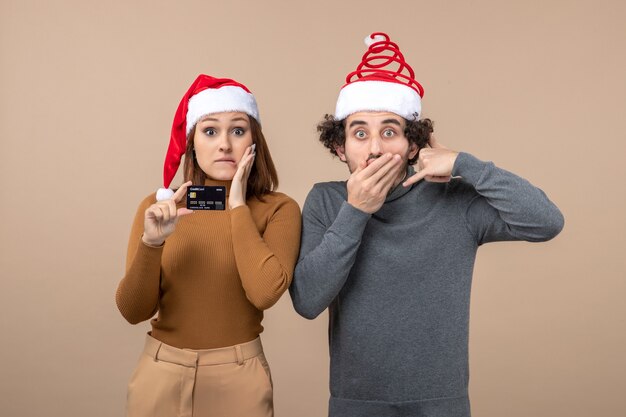 A young couple posing in the studio