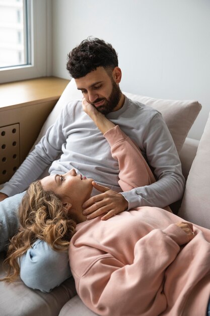 Young couple relaxing at home