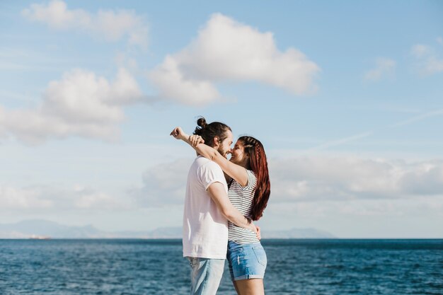 Young couple at the sea