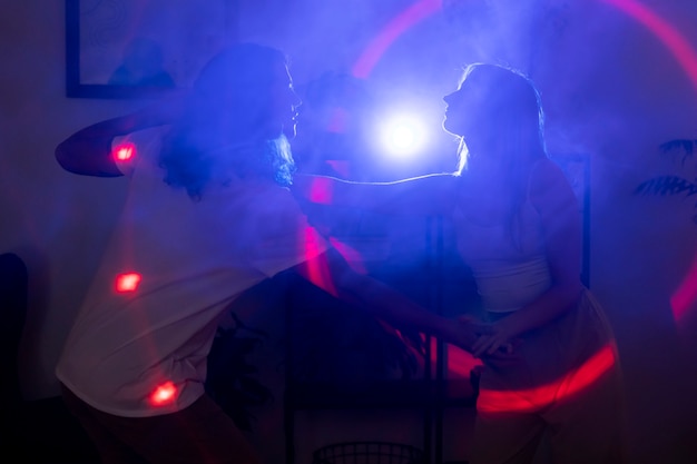 Free Photo young couple spending time together at night