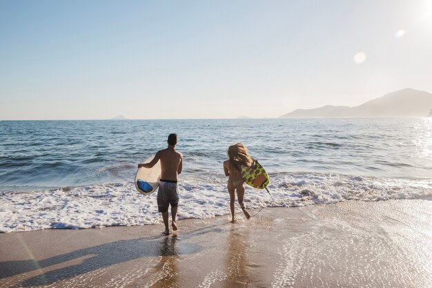 Young couple on a surf day