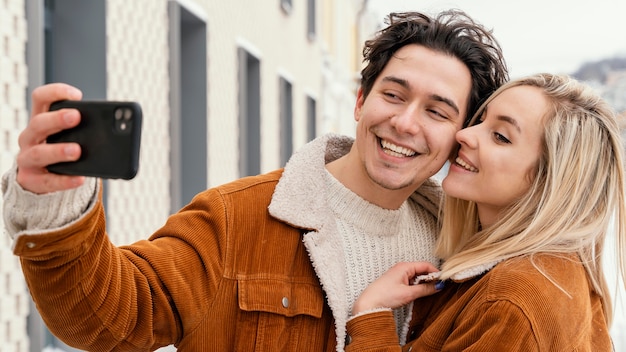 Young couple taking photos