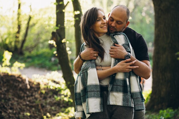 Young couple together in the forest