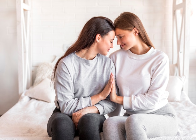 Young couple touching hands