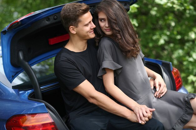 Young couple traveling by car