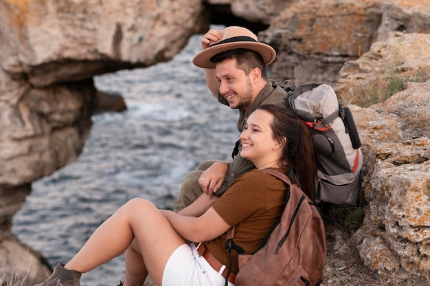 Free photo young couple travelling together