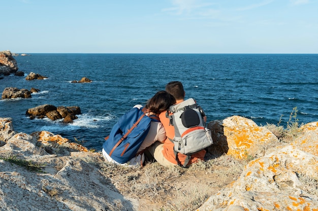 Free photo young couple travelling together