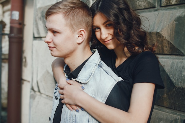 Free photo young couple wallking in a old city