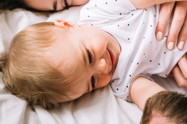 Young couple with baby in the morning