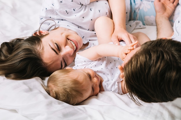 Young couple with baby in the morning