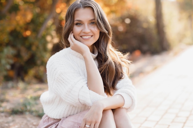 young cozy woman outdoors