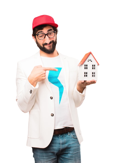 young crazy businessman with house