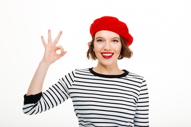 Free Photo young cute woman showing okay gesture.