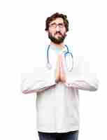 Free photo young doctor man praying