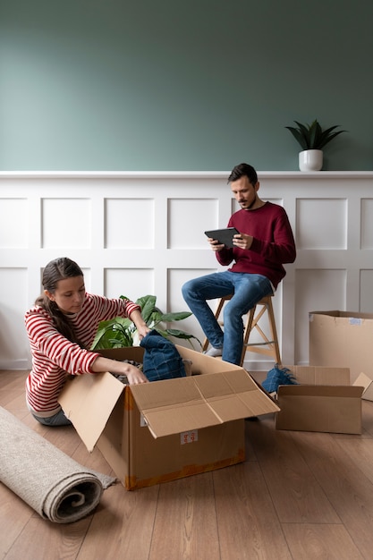 Young family moving into a new home