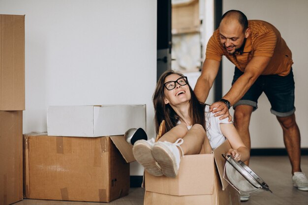 Young family moving into their new house