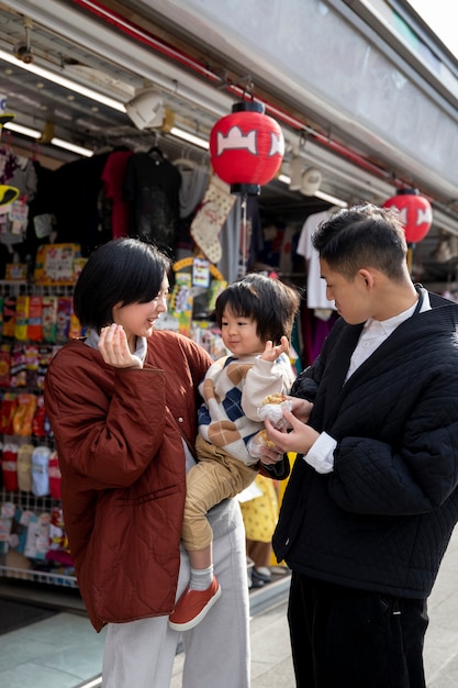 Young family spending time with their toddler