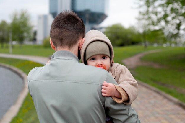 Young father with his baby