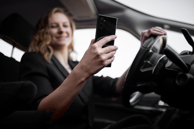 Free photo young female being an uber driver