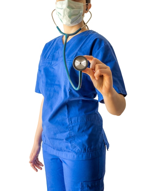 Free photo young female doctor in a blue medical uniform holding a stethoscope isolated on a white