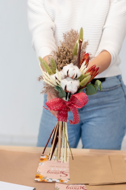 Free photo young female florist medium shot