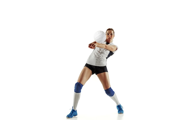 Free Photo young female volleyball player isolated on white  background.