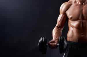 Free photo young fitness man in studio